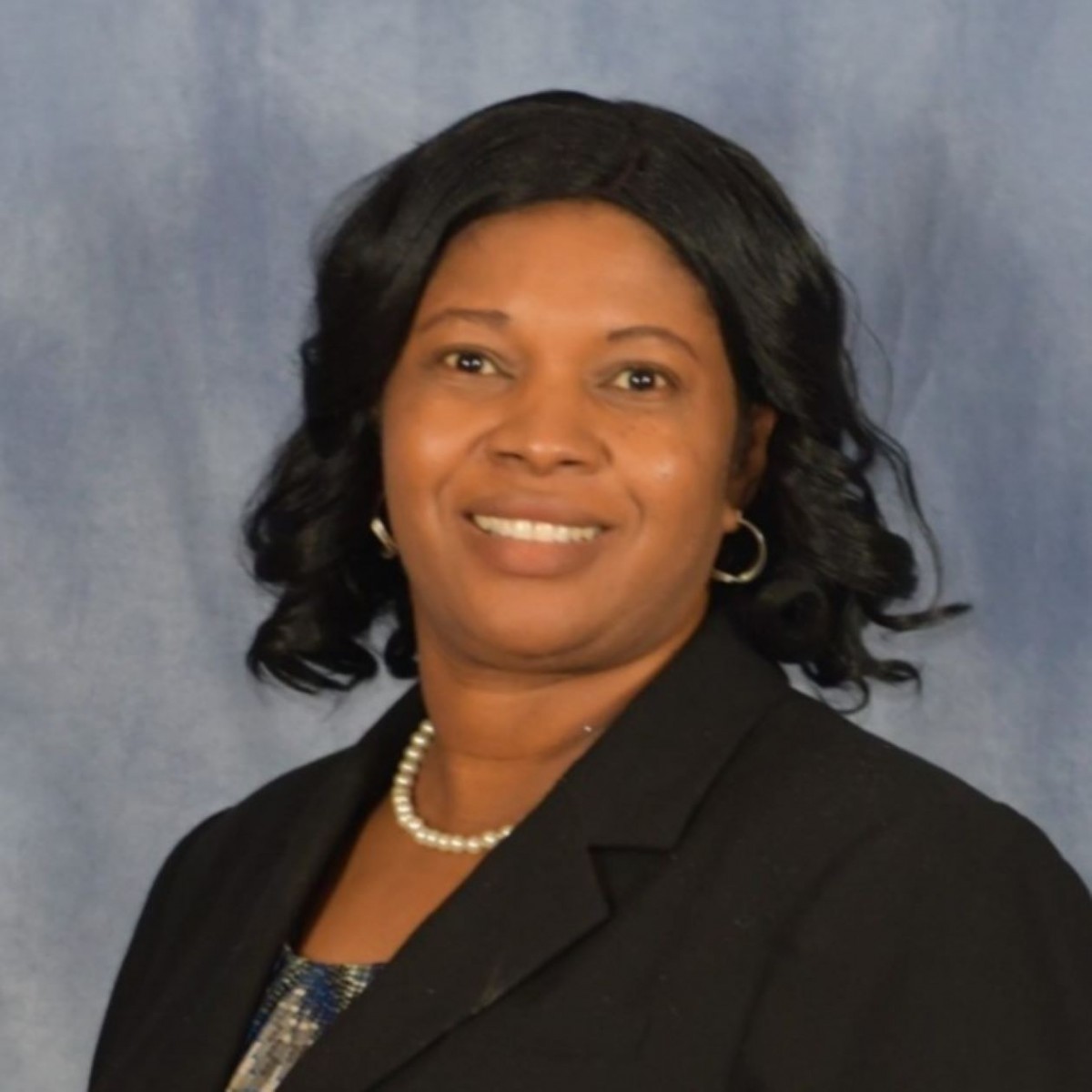Dr. Esther Obi